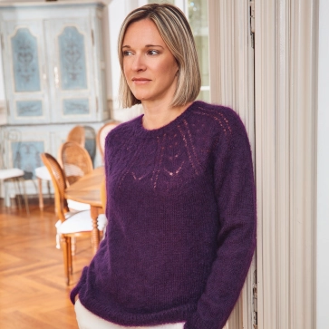 Pull en laine ajourée manches longues femme